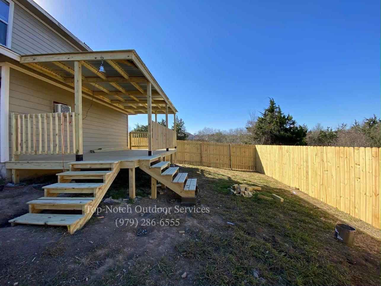 Covered porch with metal awning roof and open stairs